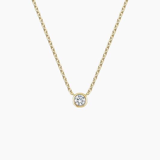 Diamond Bezel Solitaire Pendant 0.10 ct  in 18K Yellow/White Gold